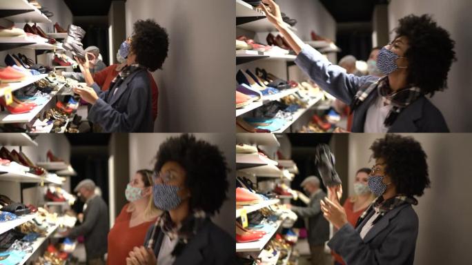 戴着口罩的年轻女子在旧货店买鞋时得到了女售货员的帮助