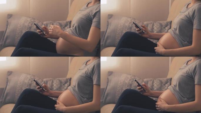 腹部未发现的孕妇检查手机上的消息