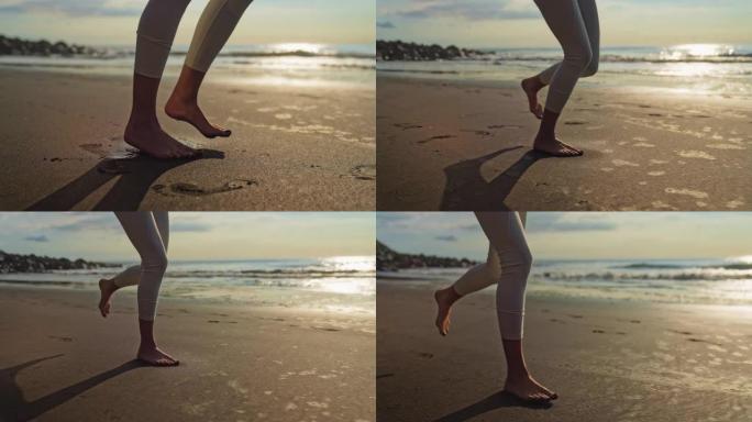 海滨慢跑训练。享受阳光和自由。腿部特写