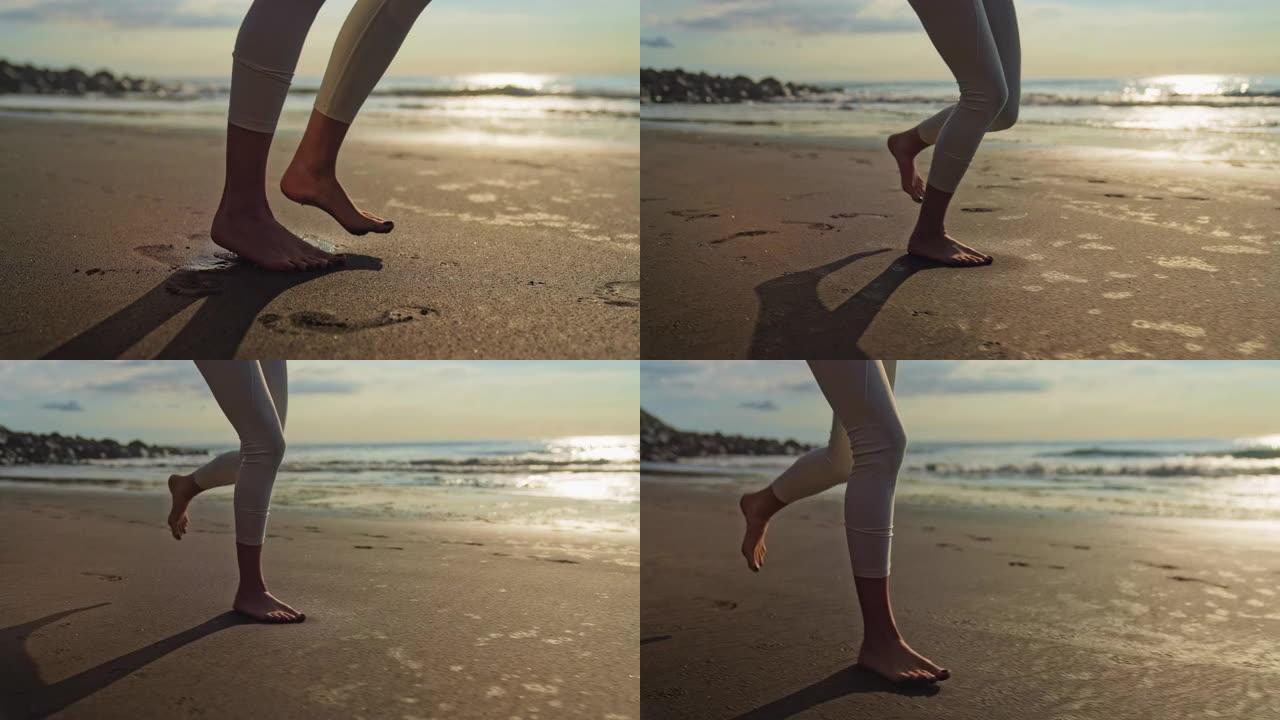 海滨慢跑训练。享受阳光和自由。腿部特写