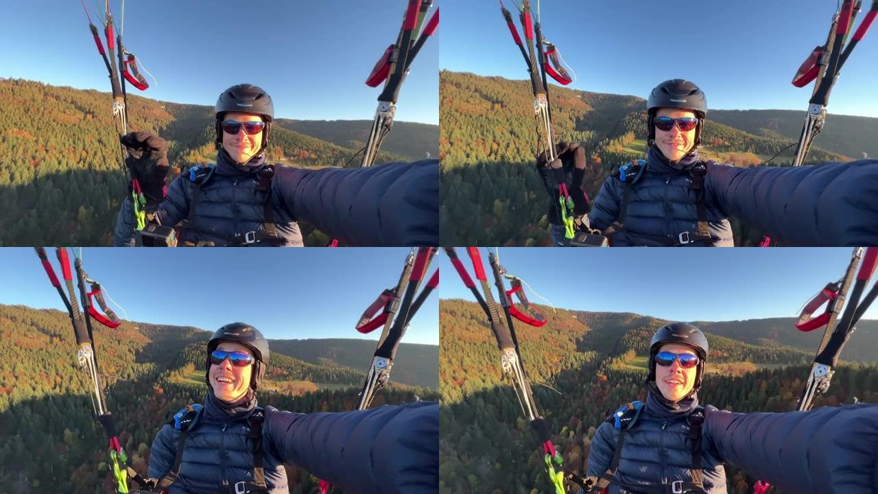 一个年轻人在山上滑翔伞的第一人称视角