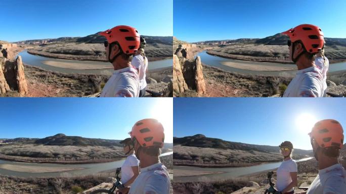 山地自行车夫妇望向科罗拉多河