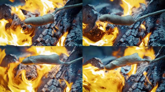 在篝火上烹饪食物的详细照片