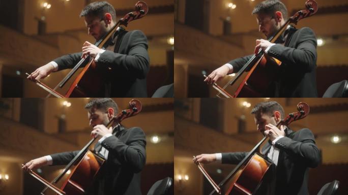 才华横溢的大提琴家正在演奏大提琴，经典音乐音乐会或排练，交响乐团