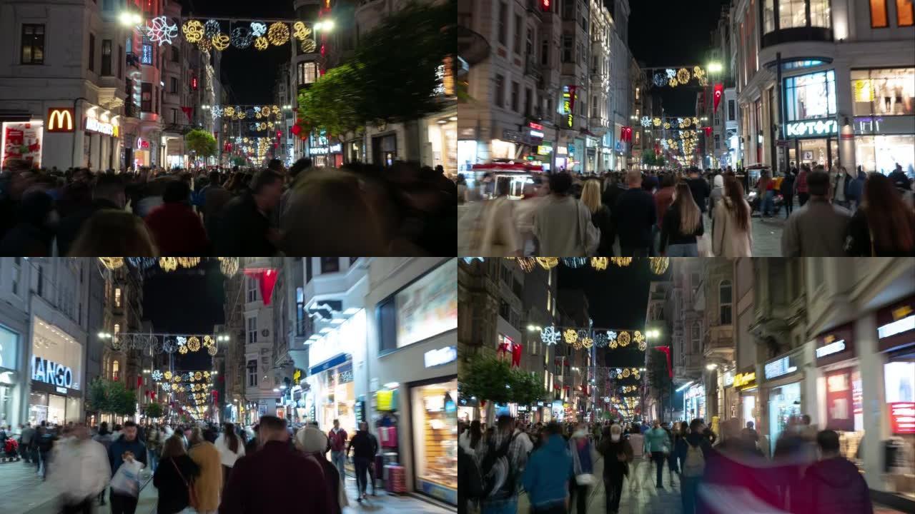 伊斯坦布尔市中心夜间照明著名的拥挤街道步行全景4k延时土耳其
