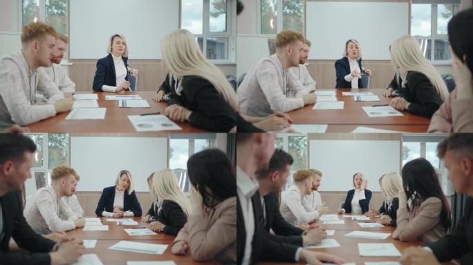 紧张愤怒的女老板在商务会议期间与员工交流