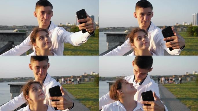 年轻的残疾夫妇在智能手机上自拍