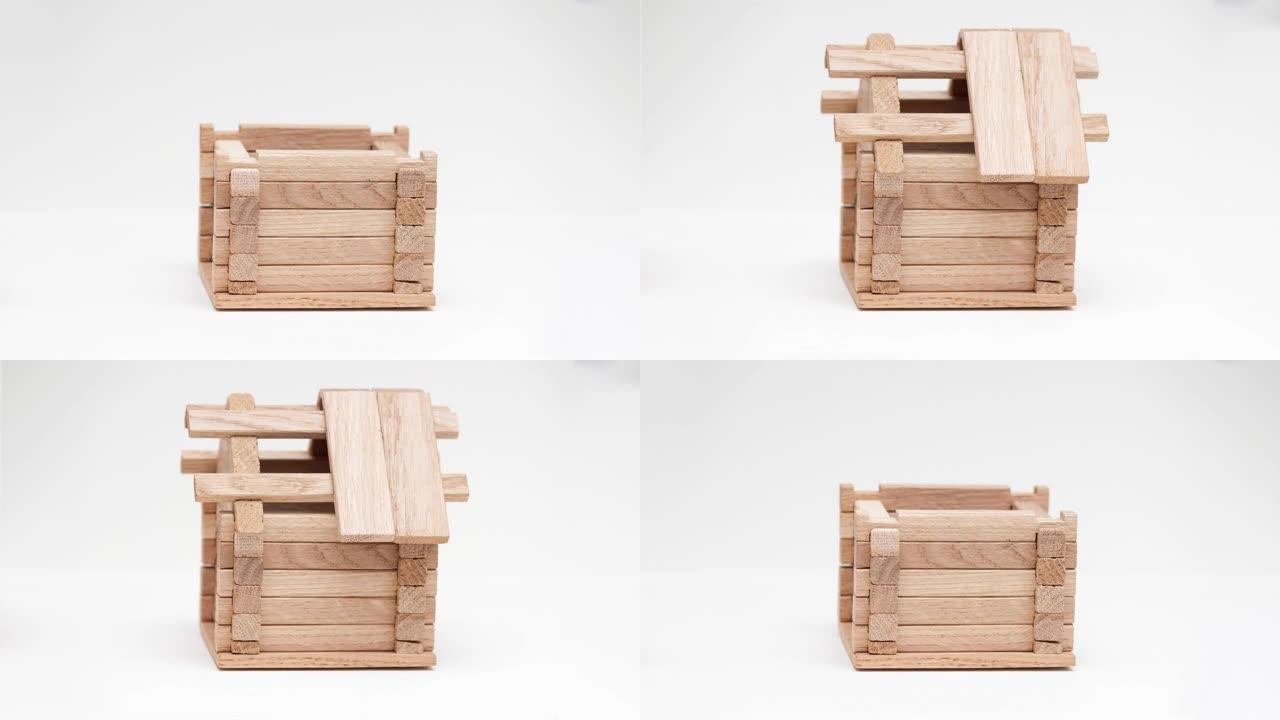 搭建木制玩具屋的定格动画。