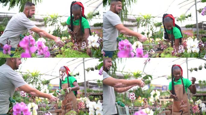 女售货员帮助顾客选择鲜花