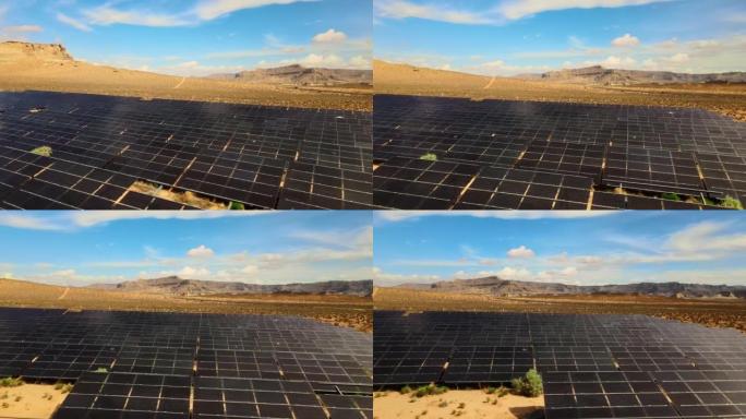 无人机空中飞行犹他州太阳能农场的近景。干旱沙漠中的绿色能源生产
