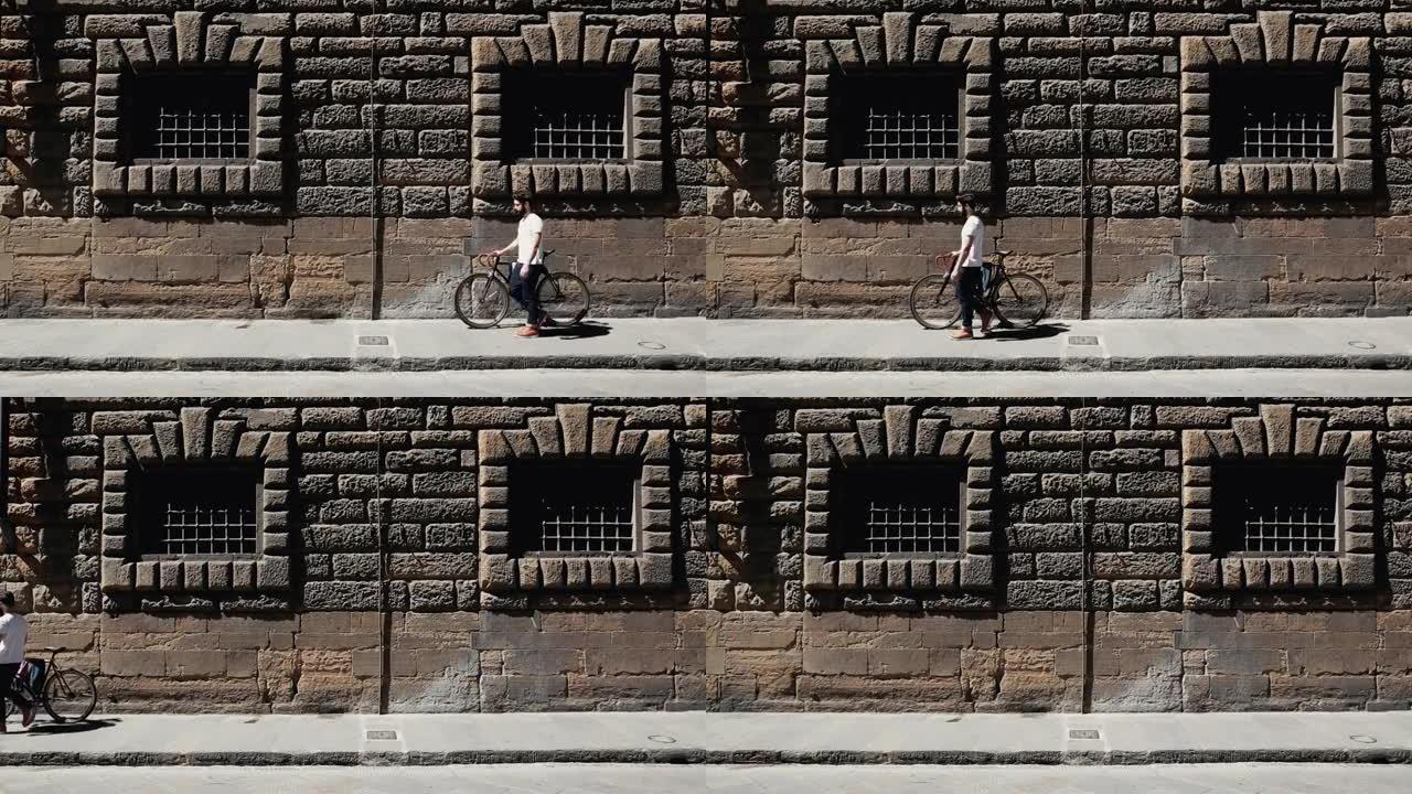 意大利佛罗伦萨骑自行车的时髦男人