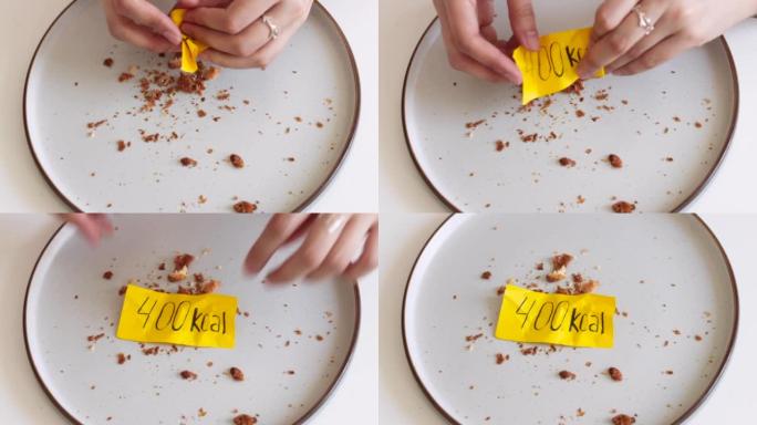 woman hands put on empty plate with crumbs calorie