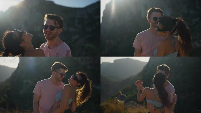 可爱的旅游夫妇在山里慢舞，风景优美