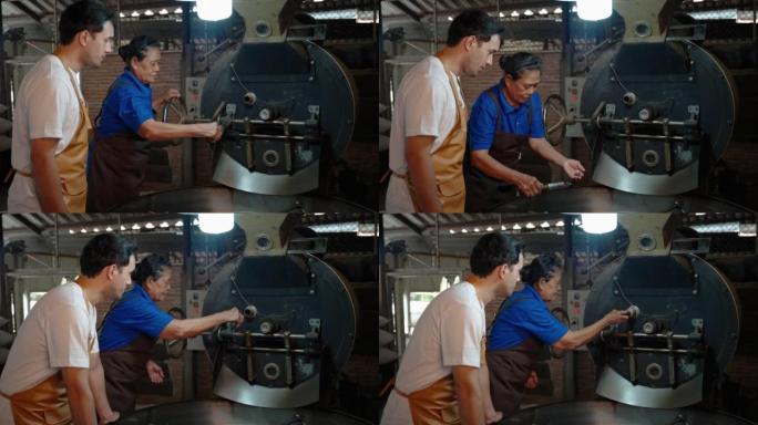 老年妇女咖啡烘焙师正在一个家庭式的小工厂里教一个年轻人咖啡烘焙。
