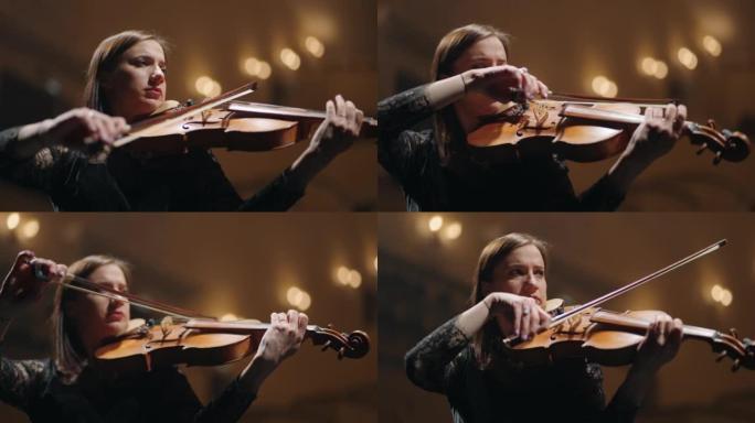 女人在音乐厅演奏中提琴，音乐厅现场女音乐家的肖像