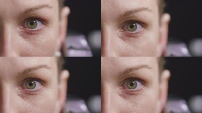 SLO MO LD女人睁开绿色的眼睛