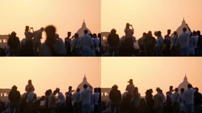 罗马的伟大之美: 人们在日落时拥有圆顶和天际线的剪影