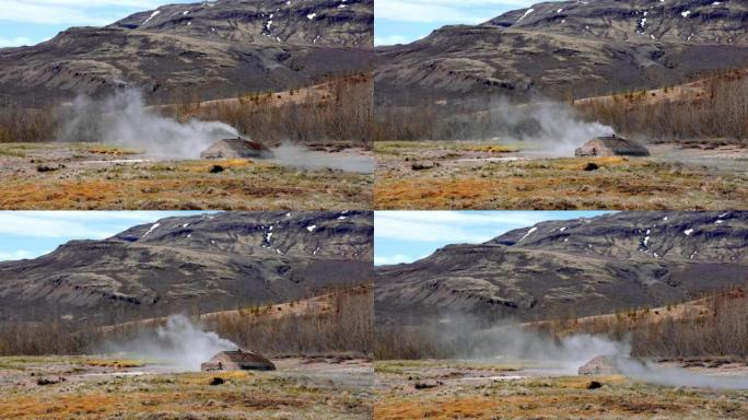 冰岛Strokkur间歇泉排放的蒸汽。阳光明媚的日子里美丽的间歇泉喷发。