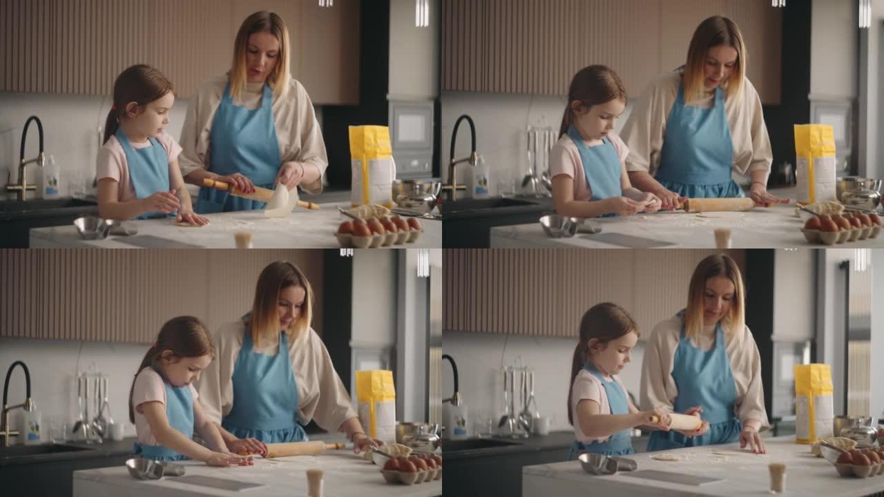 母女俩在家庭厨房里煮蛋糕或面包，女人在教孩子做饭