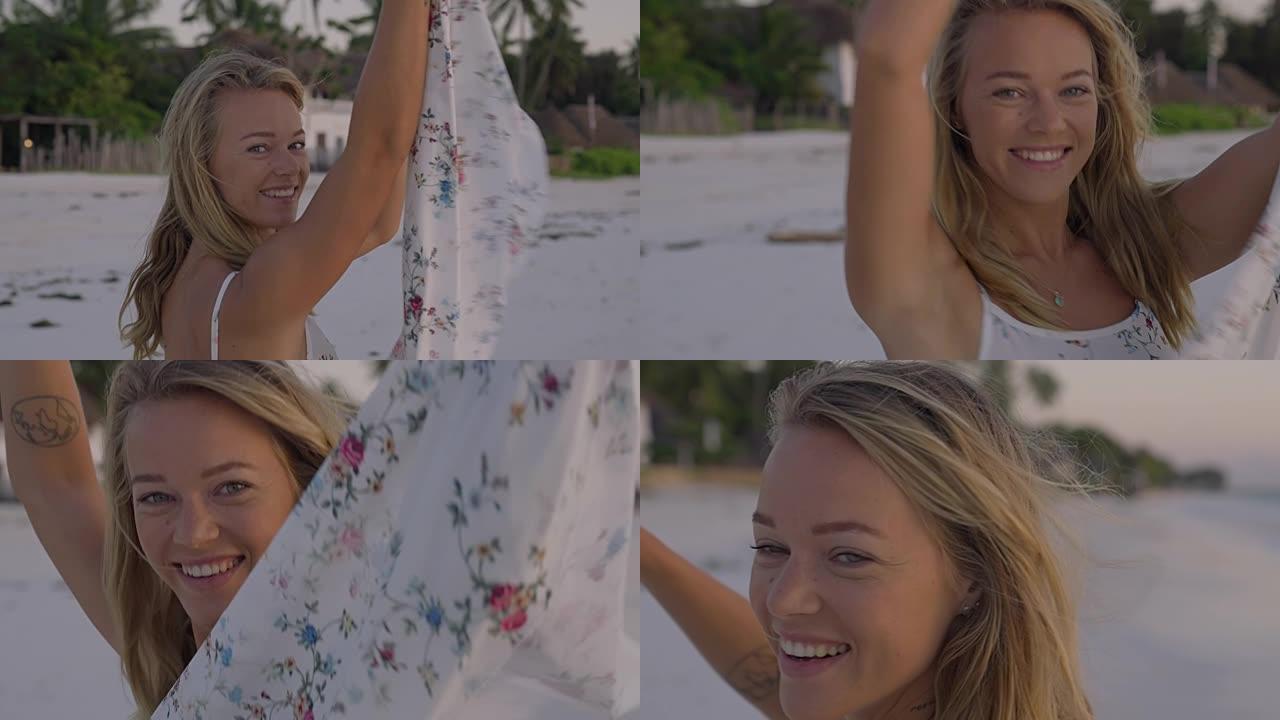 穿着夏装的诱人女人享受海滩日落。微笑着用相机调情
