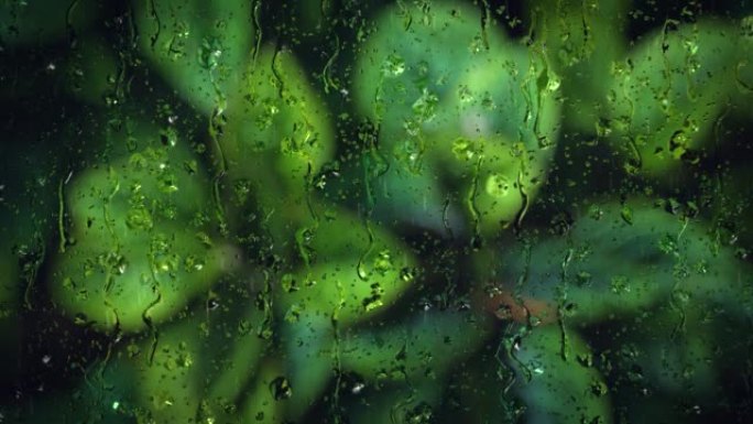 4k循环动画背景雨滴落下绿屏。冬季天气
