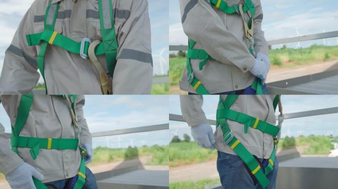 在风力涡轮机工作的专业技术人员工业攀登者。