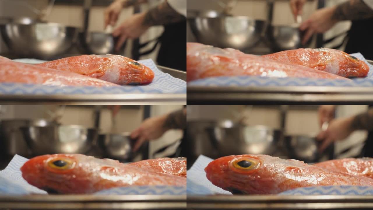 厨师为烹饪准备鱼的详细照片