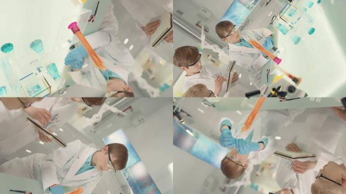 好奇的男孩进行科学实验。实验室内部，沸腾，泡沫液体