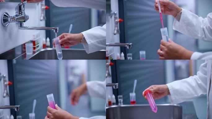 女生物学家抽取自来水样本加入试剂后摇动小瓶