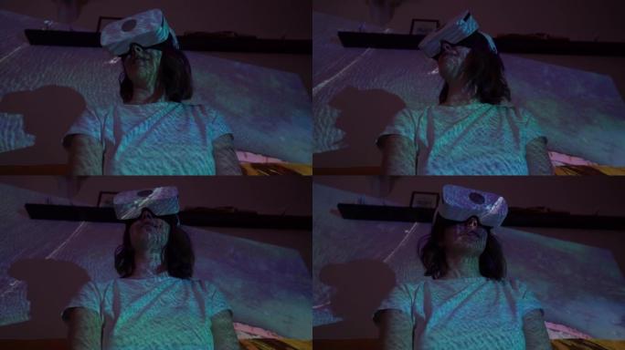 女人用虚拟现实眼镜去另一个光点看海。