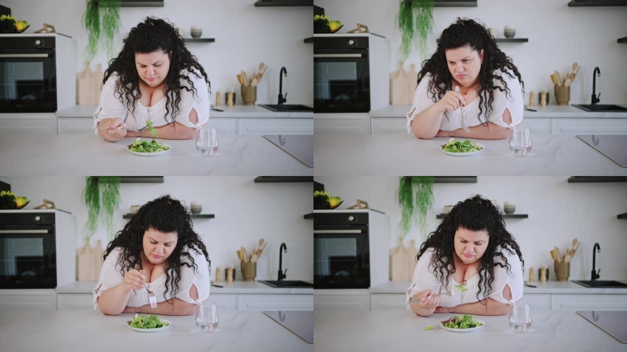 超大号黑发女人吃素食沙拉不满意