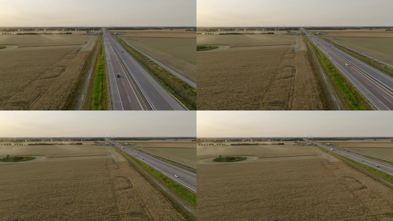 农业季节日落时德国高速公路的鸟瞰图