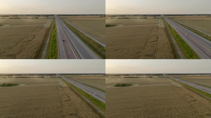 农业季节日落时德国高速公路的鸟瞰图