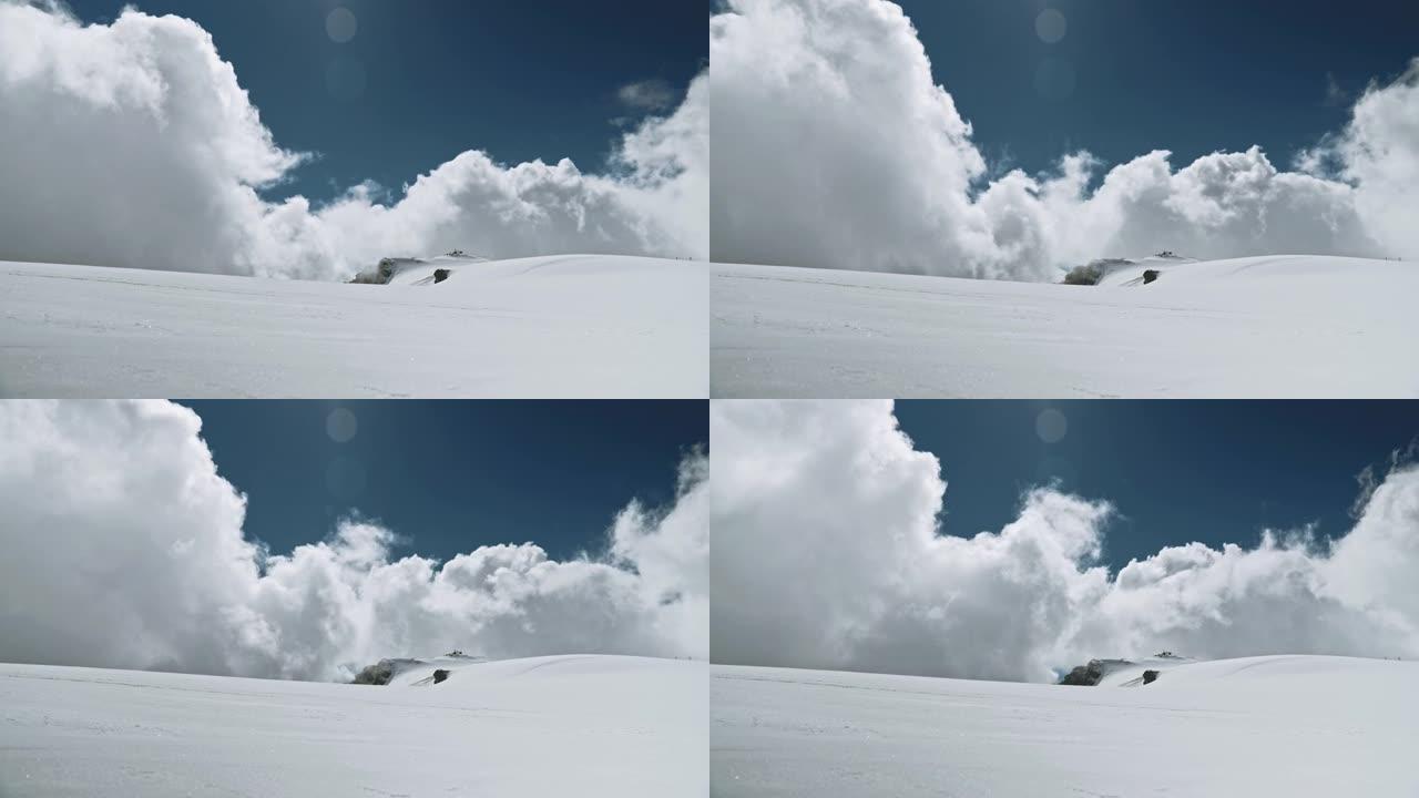雄伟的冰山。雪山景观，山谷中的云
