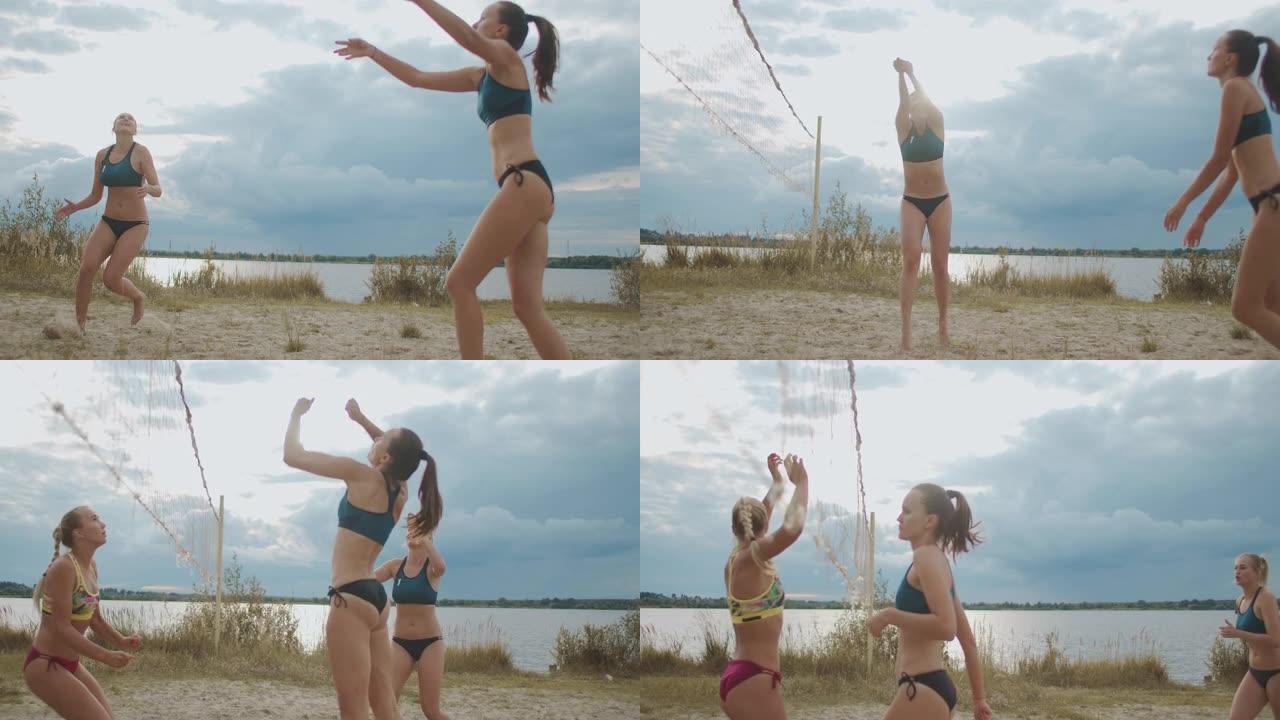 运动型女性在夏天打沙滩排球，在白天对着多云的天空慢动作射击