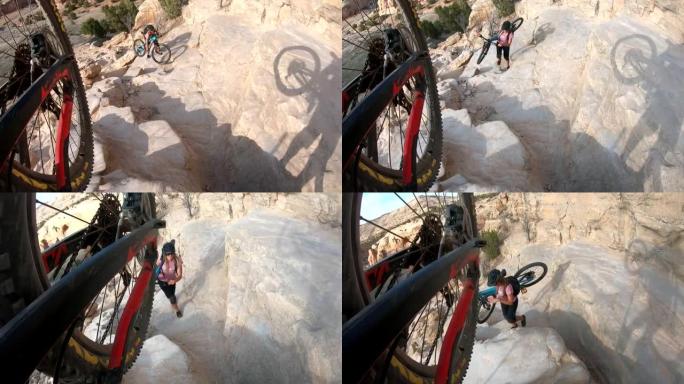女性山地自行车手在沙漠中骑着自行车爬上陡峭的岩石