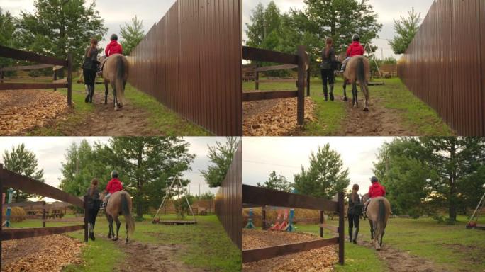 认证的治疗骑马教练正在小马俱乐部训练幼儿，小孩子在大自然中骑马