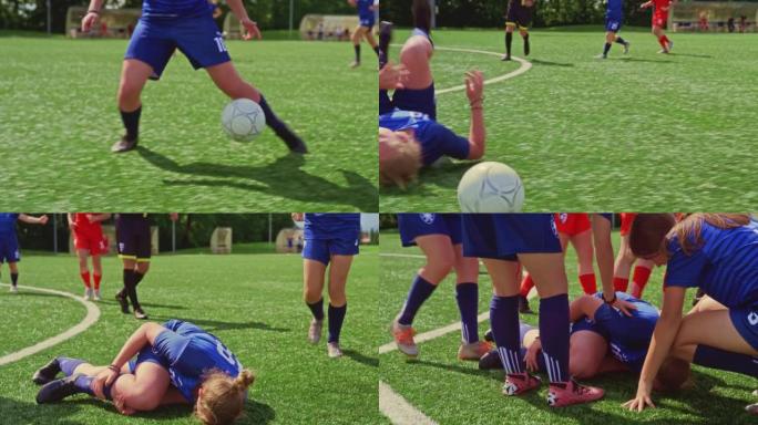 SLO MO TS女足球运动员在足球比赛中痛苦地摔倒在地