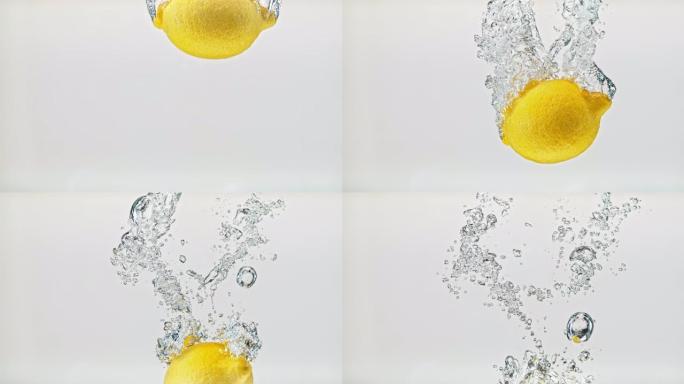 SLO MO LD整个柠檬在白色背景下落入水中