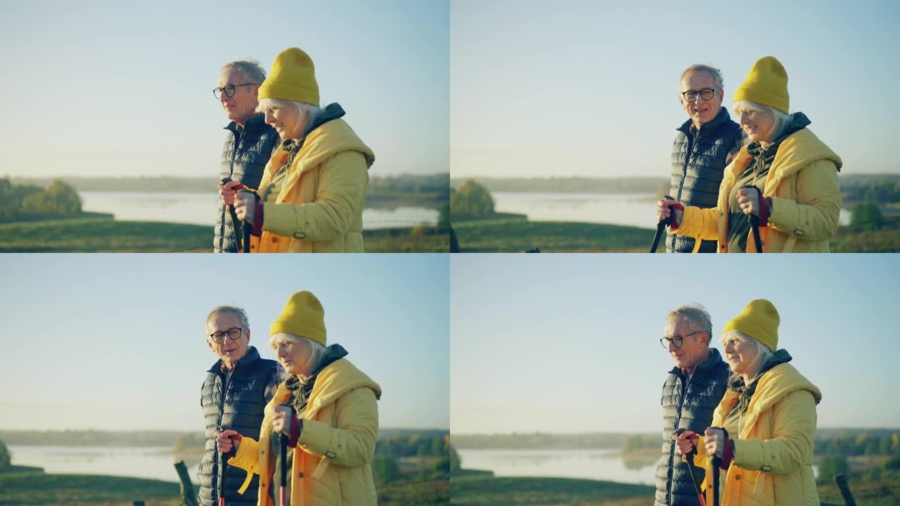 一对在乡下散步的老年夫妇。北欧一起散步