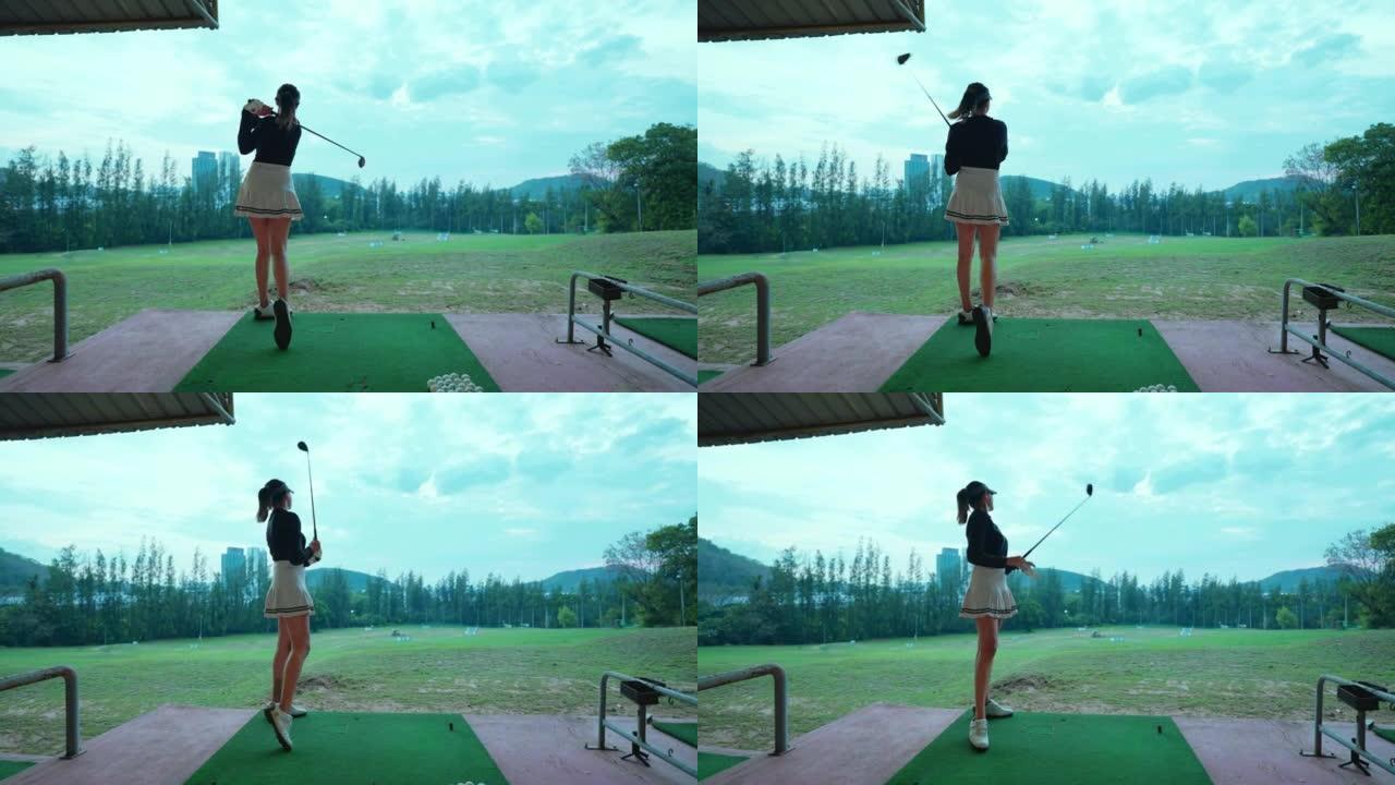 亚洲女高尔夫球手打高尔夫球开球。