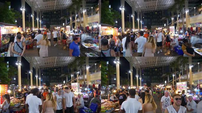 著名的夜间普吉岛街头食品市场步行慢动作全景4k泰国