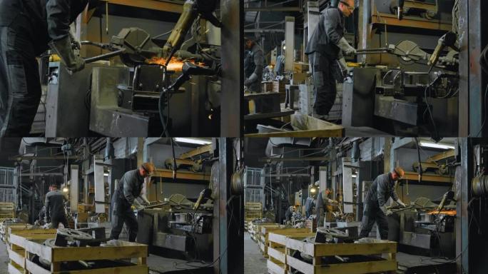 铸造厂的DS男工人通过打磨金属铸件