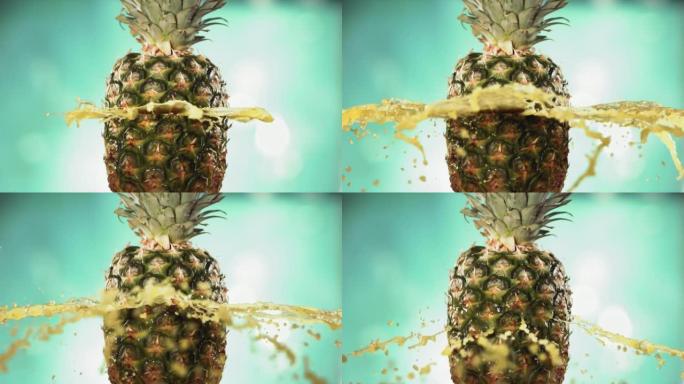 新鲜菠萝水果在绿松石蓝色背景4K慢动作中喷出并爆裂果汁