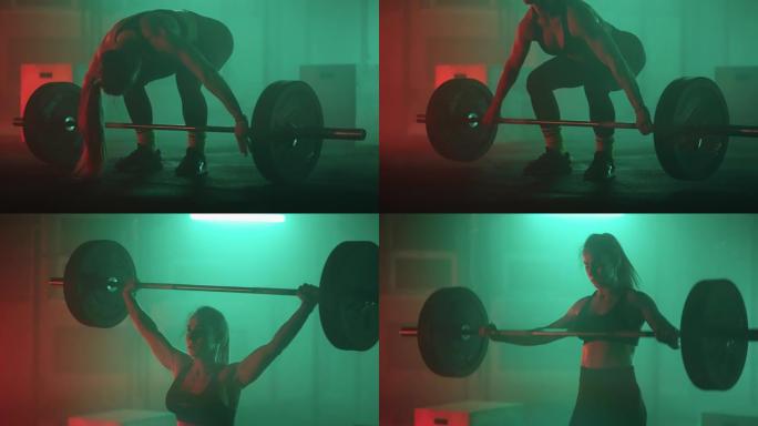运动女子正在健身房举重杠铃，训练她的耐力和力量