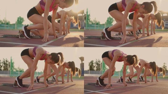 三名女运动员同时开始马拉松，竞争，慢动作。比赛前站在起跑线上的妇女