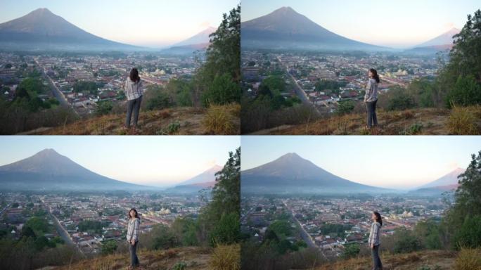 站在危地马拉火山背景上的女人