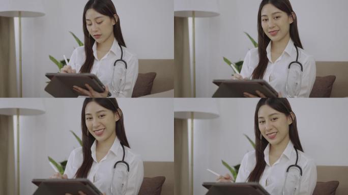 专业女性医生在临床上使用数字平板电脑