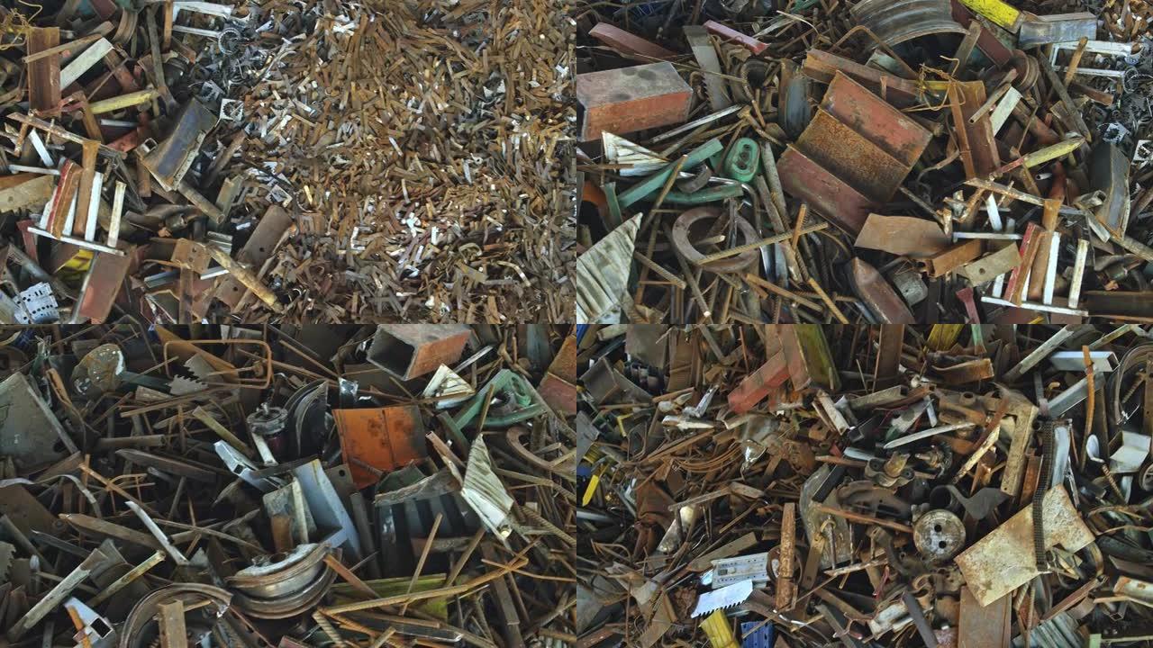 CS在回收设施中分类成堆的废金属