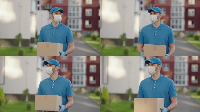 一位年轻的邮递员快递员戴着防护口罩和手套，正在安全地将包裹直接运送到客户家中。快递，送货上门，电子商